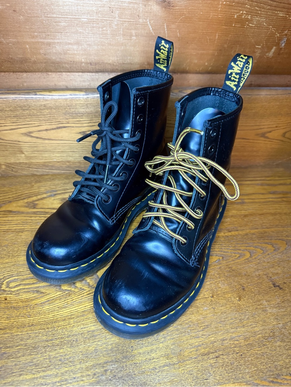 Dr. Martens Black Leather Lace-Up Boots with Yellow Accents